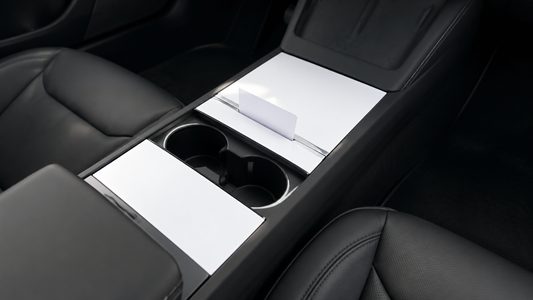 2024 Tesla Model 3 Highland black interior with white PVC center console cover panels and card slot