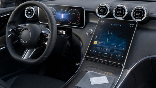 Glossy tempered glass protectors installed on the 11.9-inch center touchscreen and 12.3-inch instrument display in a Mercedes-Benz GLC 300 cabin