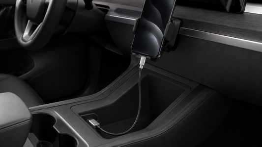Right-angle USB-C cable routed neatly from a Tesla Model 3 or Model Y center console to a phone mount