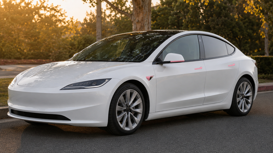 White 2024–2026 Tesla Model 3 Highland with pink door handle, side camera, and mirror trim accessories