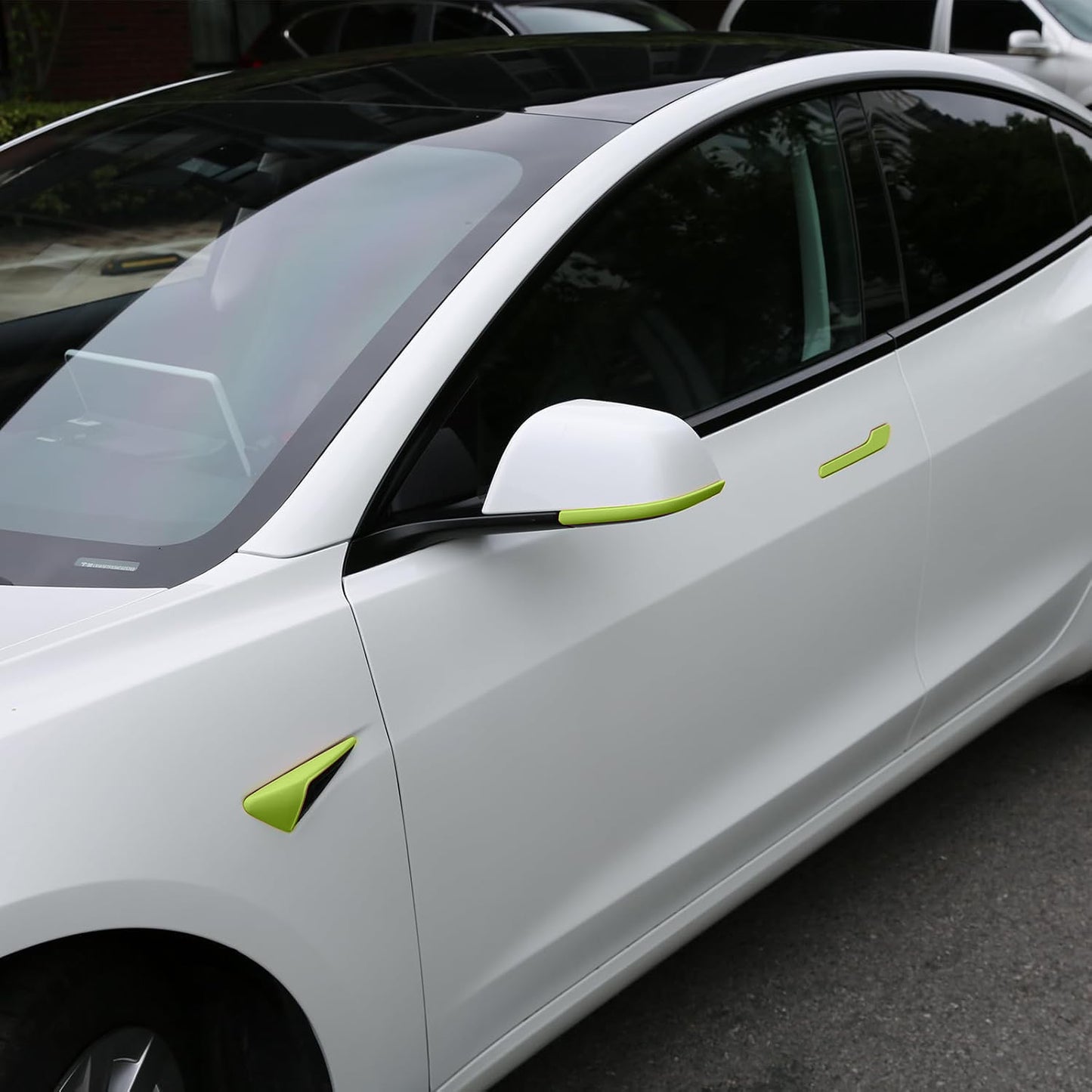 Green Tesheer accessories kit on Pearl White Tesla Model Y Juniper showing color contrast