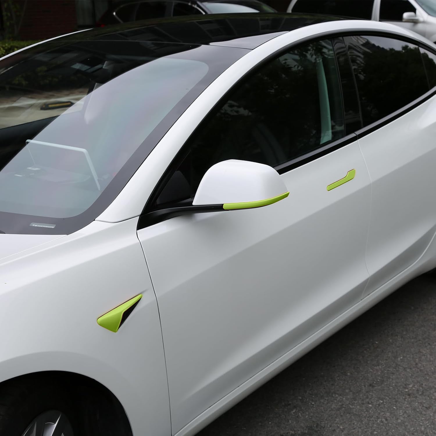 Green Tesheer accessories kit on Pearl White Tesla Model Y Juniper showing color contrast