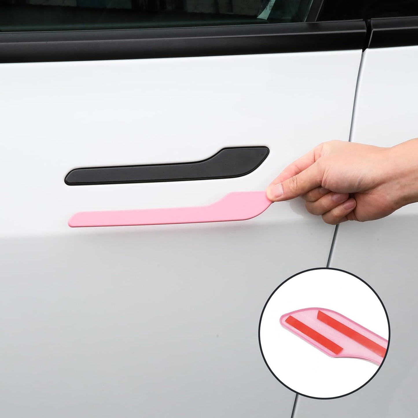 Pink Model Y door handle cover detail showing smooth high-gloss exterior finish