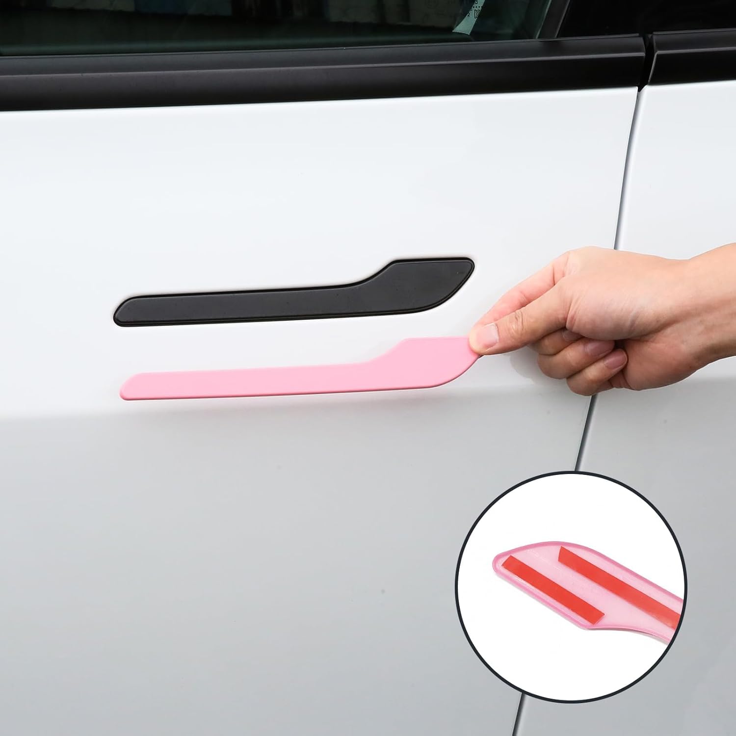 Pink Model Y door handle cover detail showing smooth high-gloss exterior finish