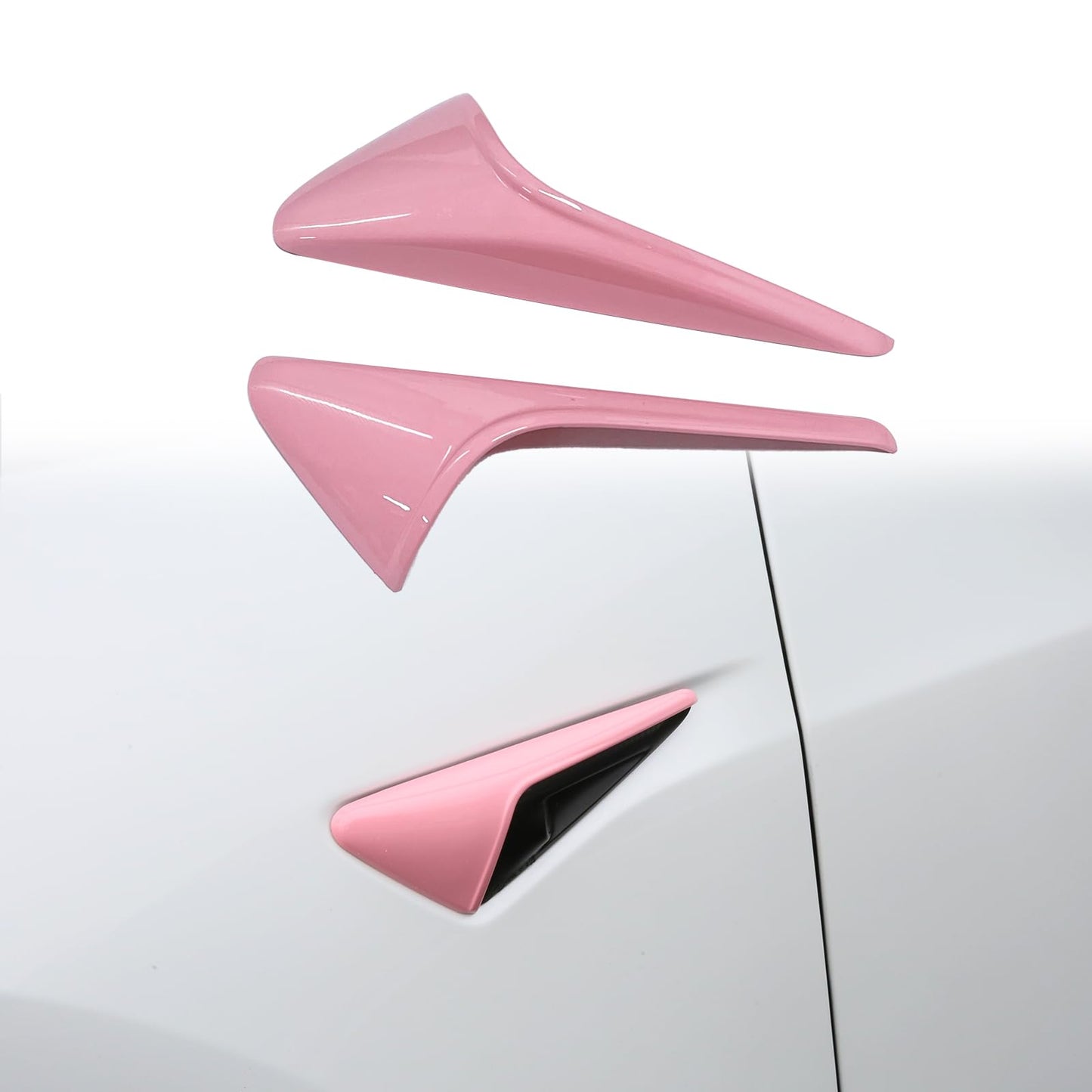 Pink HW 4.0 camera cover on Tesla Model 3 Highland side fender