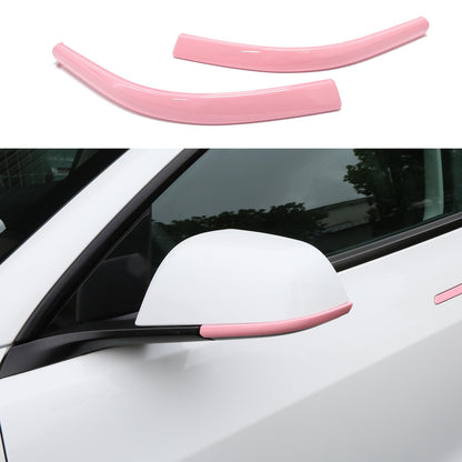 Pink side mirror trim strip on Tesla Model Y